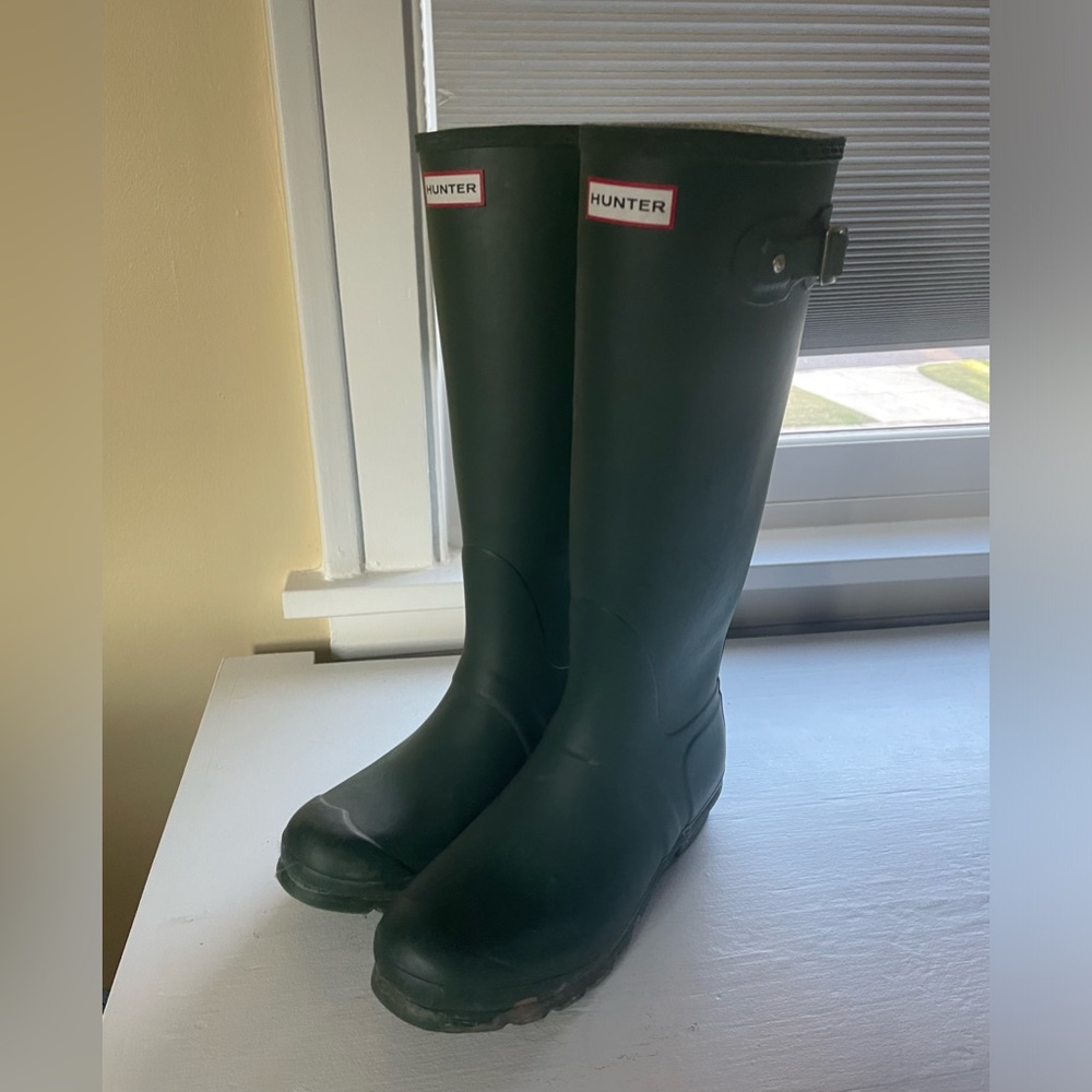 Classic tall green hunter boots. Sold with knit insert.